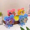 Novo Mini Suporte Criativo Mini Projetor de Manivela Pingente Chaveiro Fofo Desenho Animado Brinquedo de Alívio de Estresse Ornamento
