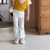 Pantalones casuales de primavera y otoño para niñas, elegantes y modernos, estilo coreano, ajustados y acampanados con bordes deshilachados para niños