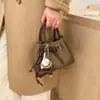 Bolsa de Mão Versátil Retrô para Mulheres 2026 Nova Moda Casual Bolsa Tote Pequena de Luxo Bolsa Transversal