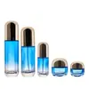 Nueva botella plana semicircular azul degradado 120ml loción tapón interior presión emulsión botella de vidrio 30g rellenada