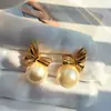 Brincos de Laço com Pérolas e Pino de Prata S999, Modernos e Versáteis, Design Exclusivo, High-End, Luxo Leve, Brincos Elegantes e Únicos