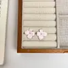 Aretes de Flor de Gota de Aceite Flor de Ciruelo Esmalte Estilo Nacional Lujo Ligero Nuevos Chapados en Oro Electrochapado Elegantes de Alta Gama para Mujer