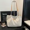 Bolsos de nicho versátiles y elegantes: Bolsos tote de gran capacidad para el día a día 2026, bolsos casuales para mujer de alta gama y a la moda
