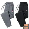 Pantalones casuales para hombre más vendidos de otoño e invierno transfronterizos, pantalones de pierna recta forrados de forro polar, pantalones finos de forro polar para otoño, pantalones de chándal de punto de talla grande, pantalones largos para hombre