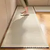 Tapete de Piso para Cozinha, Absorvente de Água, Antiderrapante, Resistente a Manchas, Conjunto de Duas Peças Longas, Tapete de Pé, Tapete de Piso de Terra de Diatomáceas Moderno Simples Transfronteiriço
