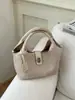 Bolso de mano vintage texturizado de nicho, bolso tote pequeño para mujer, nuevo modelo 2026, bolso tipo cubo simple, bolso de bandolera de moda