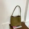 Bolso de mano transfronterizo estilo vintage, nuevo modelo otoño 2026 para mujer, bolso de hombro minimalista de nicho para el día a día con monedero a juego