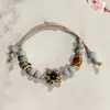 Pulsera trenzada artística étnica estilo chino nuevo de Jingdezhen para mujer, estilo antiguo, tendencia nacional, sensación de alta gama, ajustable, hecha a mano, finamente elaborada