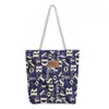 Bolsas 2025 Nova Bolsa Tote de Lona Grande Capacidade Estudante Bolsa Tote de Ombro Estampada Moda Transfronteiriça para Mulheres Bolsas