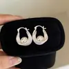 Elegante HerederaEstilo Fresco Bolso de Lunares Plateados Arete Arete Único Mujer 2026 Aretes Súper Hermosos