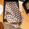 Bufanda larga con cintas, bufanda pequeña fina de primavera/verano, nueva bufanda de seda pequeña a rayas de moda de alta gama 2026 para mujer