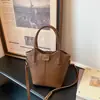 Exquisito Súper Popular Bolso Cubo de Nicho para Mujer 2026 Nuevo Estilo Moda Versátil Bolso Cruzado de Gama Alta para el Trabajo Bolso Tote Pequeño