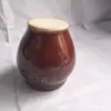 Frasco de ajo de 2 yuanes mortero de ajo frasco de ajo cerámico engrosado artículos de uso diario Linyi tienda de dos yuanes suministro al por mayor