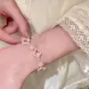 Pulseira de Contas Cool e Estilosa com Design de Trevo de Quatro Folhas, Pulseira Versátil de Nicho de Luxo, Joia da Moda Elegante com Estilo de Puxar