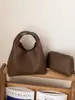 Bolsas de Nicho de Gama Alta para Mujer 2026 Nuevo Bolso de Hombro Cruzado Simple de Moda Bolso de Mano para Viaje Diario Bolso Cubo