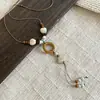 Collar de Anillo Redondo de Cerámica Retro para Mujer Estilo Étnico Sentido de Diseño de Nicho Cadena para la Clavícula 2026 Nuevo Collar Artístico Versátil
