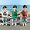 Conjunto de Ropa de Verano para Niños 2026 Nuevo Estilo Infantil Atractivo de Manga Corta con Shorts Conjunto de Dos Piezas Bebé Estilo Coreano Ropa a la Moda Tendencia