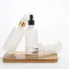 Botellas gotero esmeriladas al por mayor en stock, Botellas de vidrio para aceites esenciales, Botellas dispensadoras cosméticas, Botellas de vidrio esmerilado para aceites esenciales
