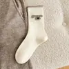 Calcetines de lana cálidos de forro polar engrosado para otoño e invierno para mujer con bordes enrollados, estilo universitario, calcetines holgados de cachemira modernos japoneses