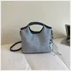 Elegante Xiaomi Home 2026 Bolso Pequeño Nuevo para Mujer Bolso Cubo Casual de Mano Textura de Moda Bolso de Hombro Único Cruzado para Viajes Tendencia