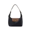 2026 Nueva Bolsa Impermeable de Nailon para Lonchera Transfronteriza, Diseño de Nicho, Bolso de Mano para Viajero, Bolso Casual de Hombro Tipo Dumpling para Mujer