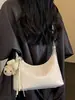 Bolso de mano para mujer Shuai Mi Jia 2026 nuevo de principios de otoño, bolso vintage para hombro o axila, bolso cruzado de alto valor para el día a día