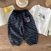 Pantalones de chándal de otoño para niño 2026 Primavera y Otoño Nuevos Elegantes Versátiles Ropa para niño Rayas Bebé Deportivos Casuales Pantalones Largos