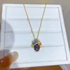 Aretes y collar de plata bañada en oro real de 18k con aguja de plata y circonita ovalada, accesorio de moda de alta gama de lujo ligero de nicho
