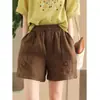Shorts Casuais Artísticos Minimalistas com Cintura Elástica de Algodão e Linho Verão Novo Versátil Solto com Design de Bolsos Calças Casuais para Mulheres