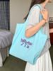 Bolsa de Relaxamento Preguiçoso 2025 Nova Deslocamento Diário Casual Combina com Tudo Estudante Lona Única Letras Bolsa Tote