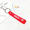 6056 # Patrón de Dibujos Animados Cuerda de Cuero de Goma Suave + Cadena de Cuatro Secciones Llavero Accesorios Mali Ao Colgante de Juguete Lanyard de Dibujos Animados