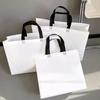 Bolsa de plástico gruesa blanca no tejida, disponible en stock, para uso escolar, educativo y de moda, para publicidad, impresa.