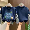 Ropa para bebés y niños 2026 primavera y otoño nuevo estilo camiseta versátil elegante para niños algodón puro patchwork a rayas camiseta básica
