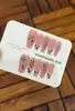 Uñas postizas de longitud media para chicas calientes, lujo ligero, rosas y delicadas, puras y seductoras, con pedrería grande, elegancia de alta gama, efecto iluminador, arte de uñas al por mayor