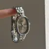 IEKE Reloj de Pulsera Metálico Estilo Frío Acero para Mujer Nicho Lujo Ligero Moda Alto Sentido Reloj de Mujer Reloj de Cuarzo Venta Caliente