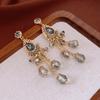 Pendientes de borlas con diseño de flor de diamante y alfiler de plata, estilo bohemio, retro, elegantes, ligeros, de lujo, de alta gama, accesorios para las orejas, venta al por mayor para mujer.