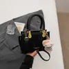 Bolso de mujer de alta gama 2026 nuevo de moda nicho súper popular bolso de mano pequeño para el trabajo, bandolera y cruzado bolso cuadrado pequeño