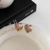 Pendientes con hebilla de oreja Love Oil, diseño de nicho, para mujer, estilo retro francés, venta al por mayor, 2023