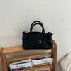Bolso de mano plisado de alta gama estilo coreano de nicho 2026, moderno y simple, con una elegante hebilla de cinturón, bolso para mujer de un solo hombro o cruzado