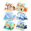 Livro de pano para educação infantil transfronteiriça Floresta marinha inseto animal variedade com papel que amassa cauda de animal tridimensional livro de pano