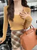 Suéter gris de cuello redondo bajo para mujer, capa base, ropa interior, nuevo estilo otoño e invierno, top de punto de manga larga ajustado