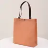 Nueva Tienda de Ropa Femenina de Celebridad de Internet Bolso de Mano de TNT a Presión Bolso Bandolera Ecológico Bolsa de Compras Ropa Femenina Accesorios de Ropa Se Puede Imprimir
