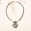 Colgante de cuerda de piel de vaca de gran venta transfronteriza, joyería de cuero, cadena de suéter de aleación de doce signos del zodiaco, collar redondo retro personalizado