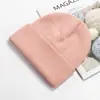 Venta al por mayor del fabricante Gorro cálido de moda para otoño e invierno, Gorro de punto a prueba de frío, Color sólido para exteriores, Protección para las orejas, Gorro de lana, Logotipo bordado