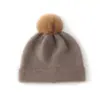 Cachemira 2026 Otoño e Invierno Nuevo Sombrero de Punto de Alta Gama para Mujer, Cálido para Exteriores, Rayas, con Pompón y Protección para Orejas, Sombrero de Punto Casual
