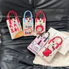 Bolso pequeño portátil de verano 2024, nuevo y popular bolso cruzado de punto para teléfono móvil.