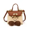 Otoño 2026 Nuevo Mini Bolso Kelly Estilo Padre-Hijo para Niños Bolso de Mano Cruzado Bolso de Mano de Dibujos Animados Texturizado Bolso de Hombro