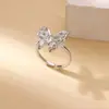 Venta Caliente Transfronteriza Anillo Abierto Corazón de Amor de Lujo Ligero Sentido de Diseño Exagerado Anillo de Flor de Zirconia con Lazo Suministro de Joyería