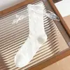 26 calcetines blancos hasta la pantorrilla, calcetines finos de malla de encaje de algodón para primavera y verano, calcetines holgados estilo ballet con lazo y diseño calado Lolita