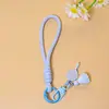 Cordón para teléfono de bádminton color macarrón, colgante de resina, correa de muñeca tejida, llavero, accesorio de cordón anti-caída para bolsa